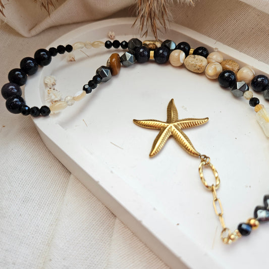 Black and yellow mixed stone necklace with a starfish pendant, citrine, landscape jasper, black tourmaline, Blue Goldstone, hematite and stainless steel details.