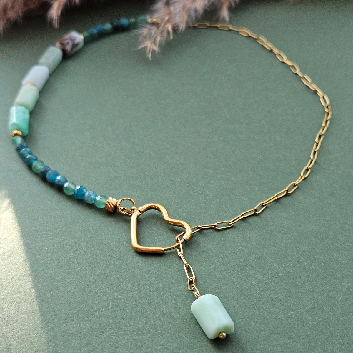 Green gemstone necklace featuring green aventurine, Australian chrysoprase , faceted apatite beads and a heart-shaped stainless steel clasp.