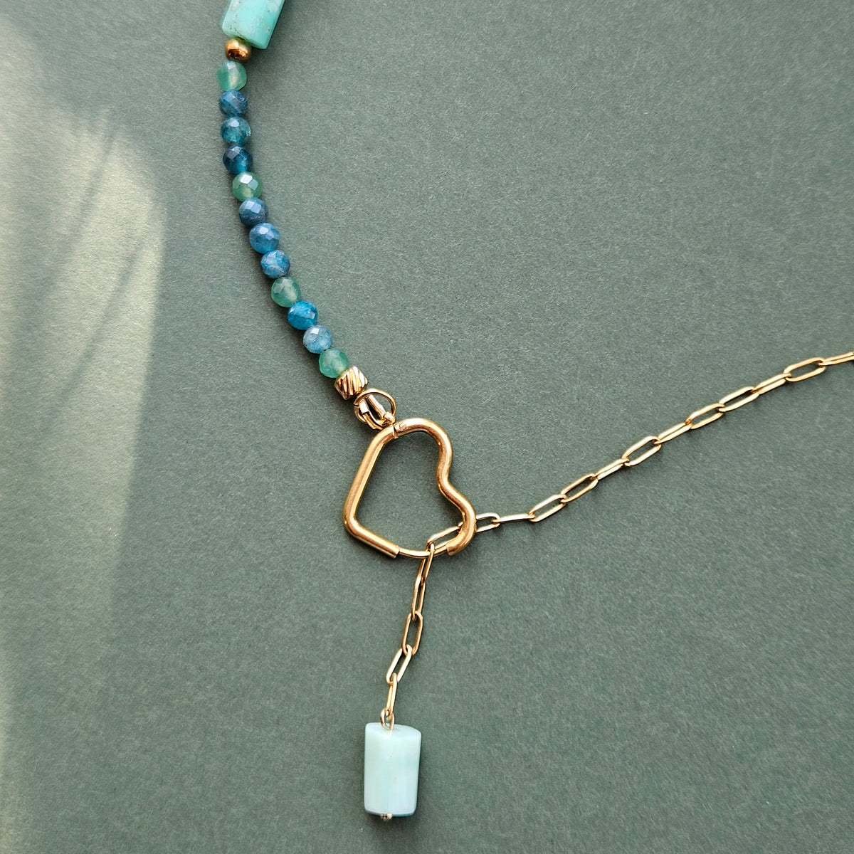 Green gemstone necklace featuring green aventurine, Australian chrysoprase , faceted apatite beads and a heart-shaped stainless steel clasp.