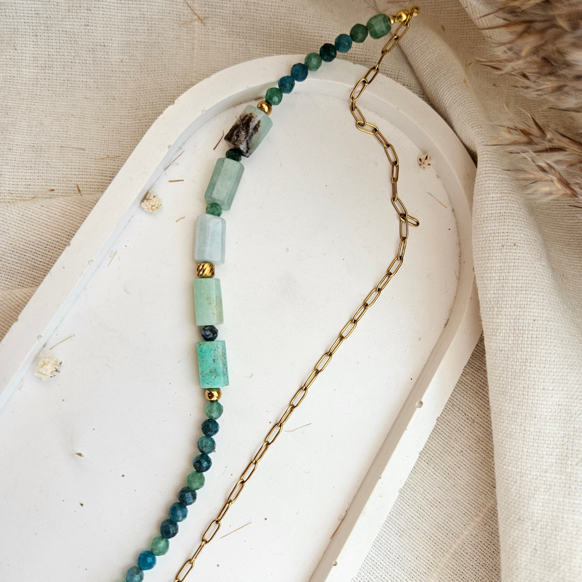 Green gemstone necklace featuring green aventurine, Australian chrysoprase , faceted apatite beads and a heart-shaped stainless steel clasp.