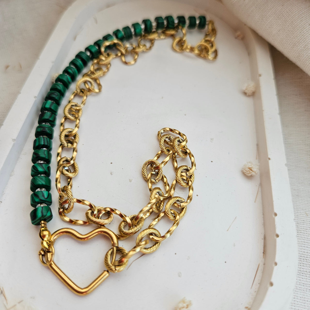 Green malachite bead necklace combined with a chunky silver stainless steel chain and a heart-shaped clasp.